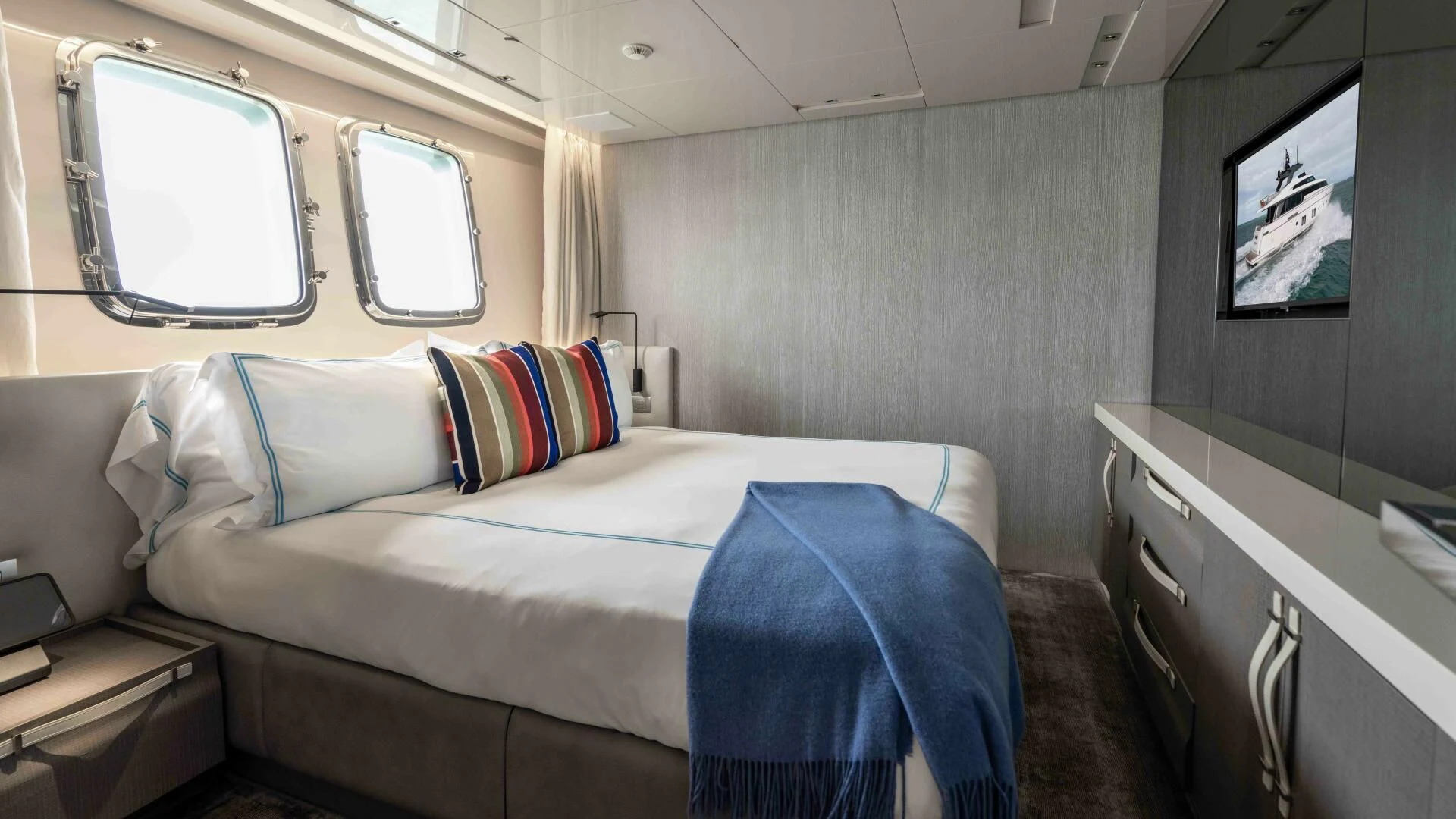 a bed in a room aboard TIME OUT I Yacht for Sale