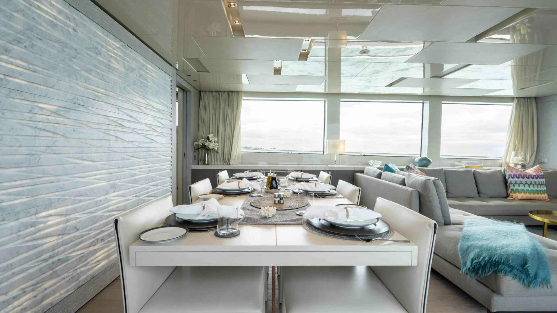 a large room with a table and chairs aboard TIME OUT I Yacht for Sale
