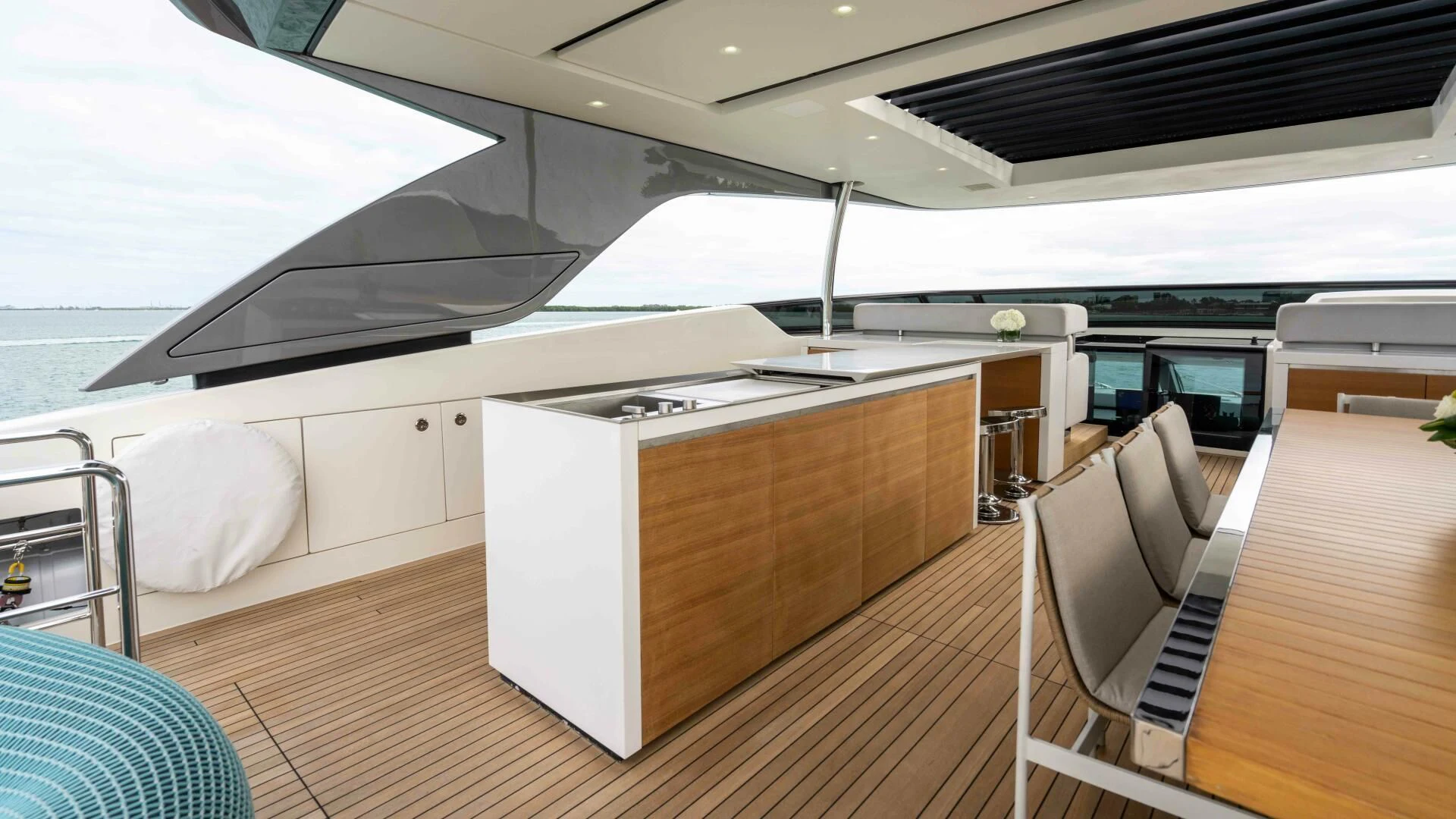 a large white boat on a deck aboard TIME OUT I Yacht for Sale