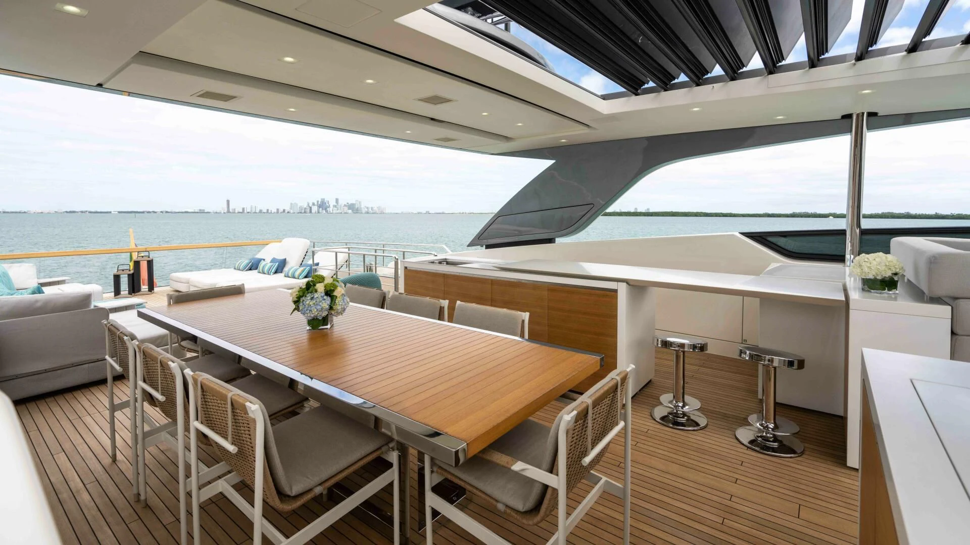 a table and chairs on a boat aboard TIME OUT I Yacht for Sale