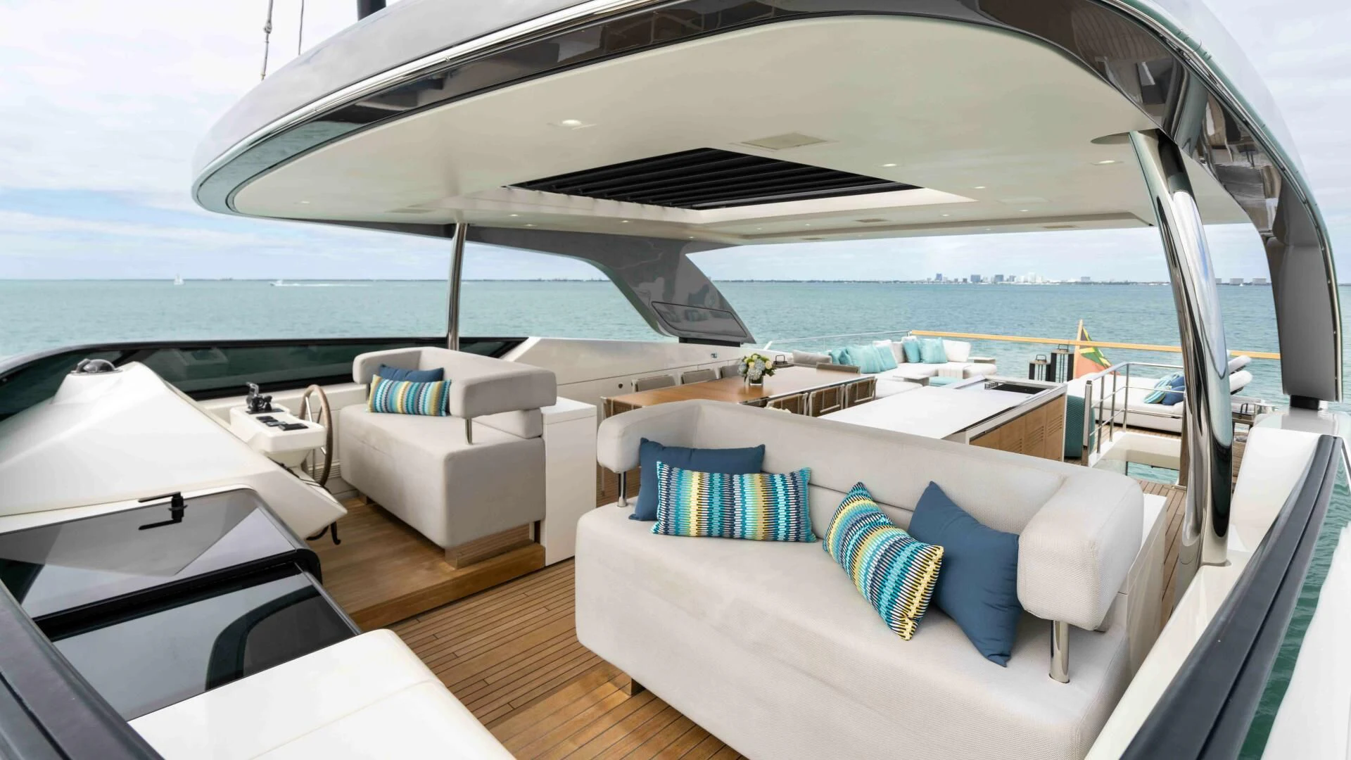 a room with a view of the ocean and the deck aboard TIME OUT I Yacht for Sale