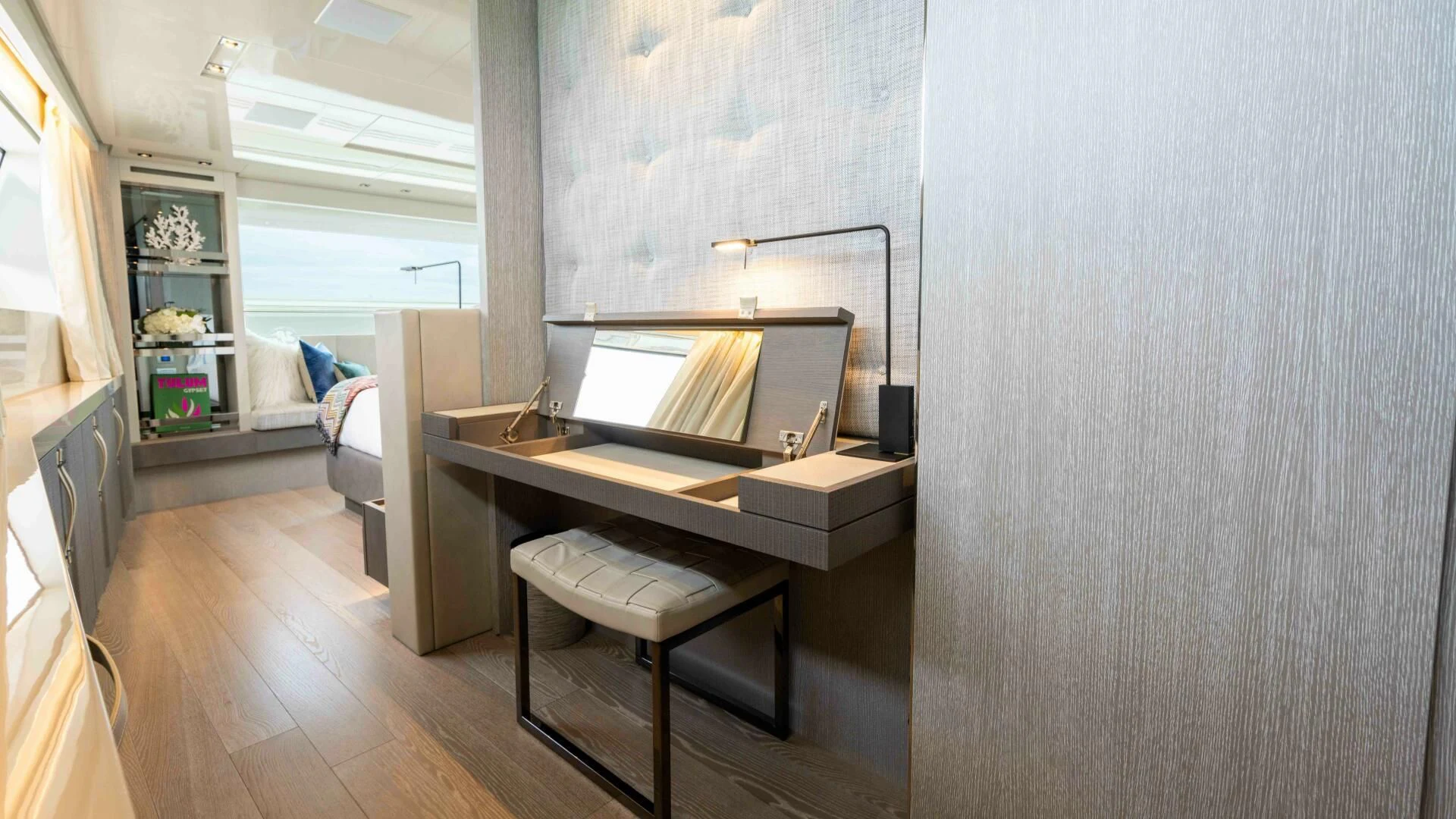 a room with a piano and a desk aboard TIME OUT I Yacht for Sale