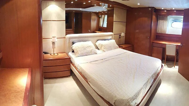 a bed in a room aboard BARON B Yacht for Sale