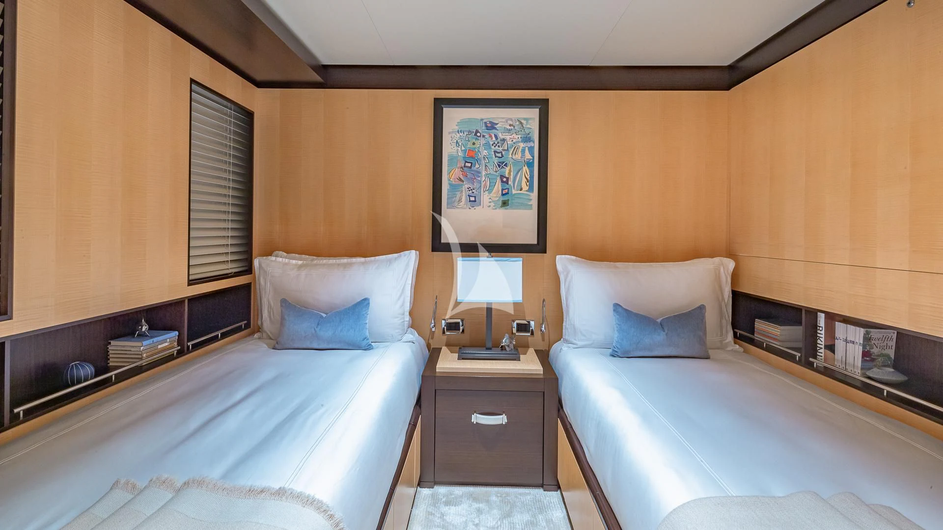 a hotel room with two beds aboard REVELRY Yacht for Sale
