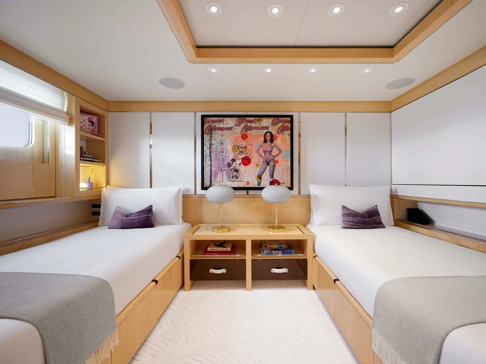 a bedroom with two beds aboard REVELRY Yacht for Sale