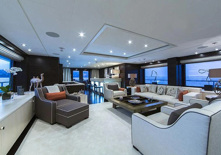a living room with a large window aboard REVELRY Yacht for Sale