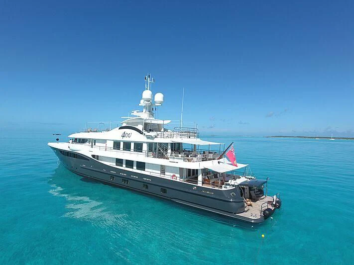 a large boat in the water aboard REVELRY Yacht for Sale