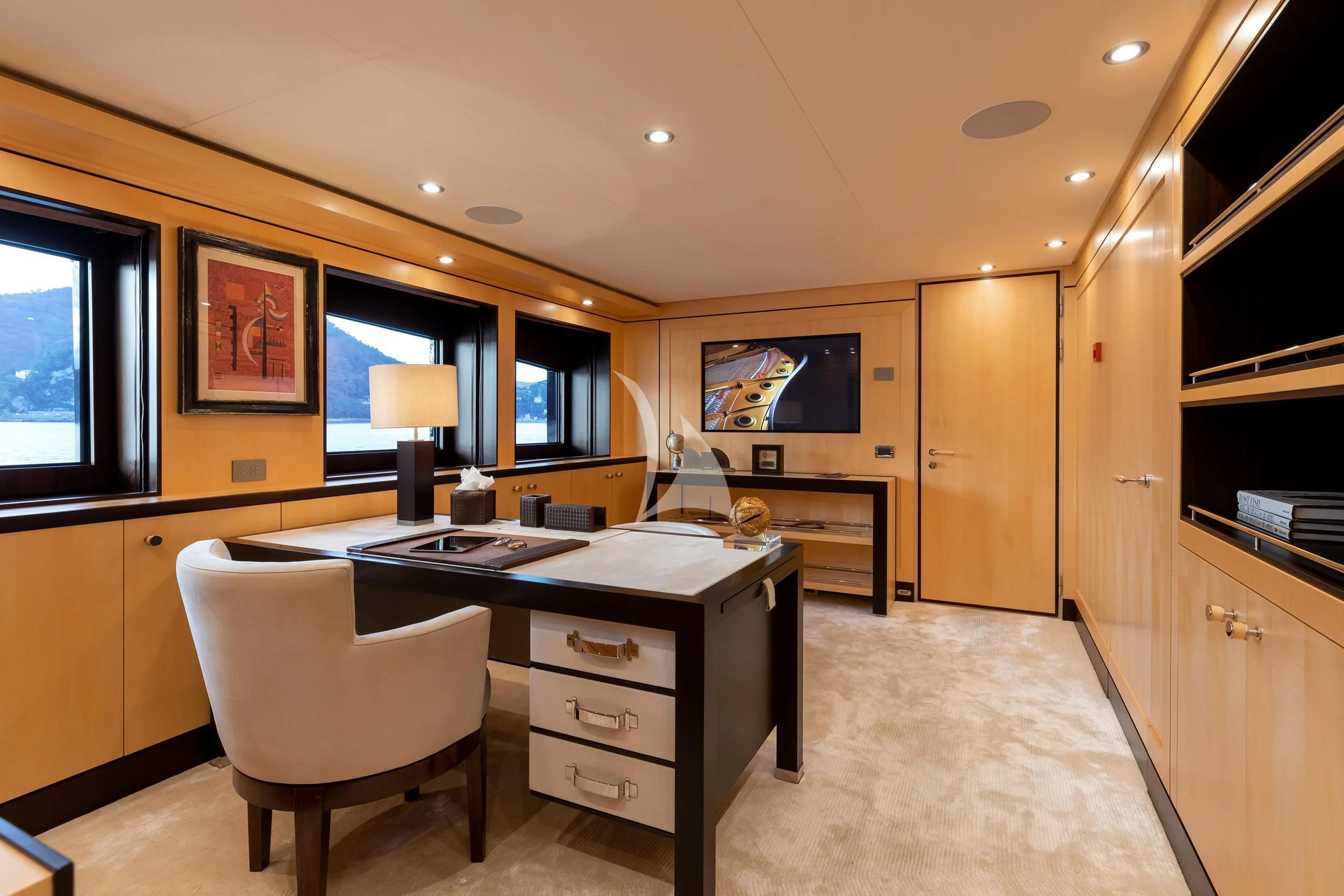 a large kitchen with a large island aboard REVELRY Yacht for Sale