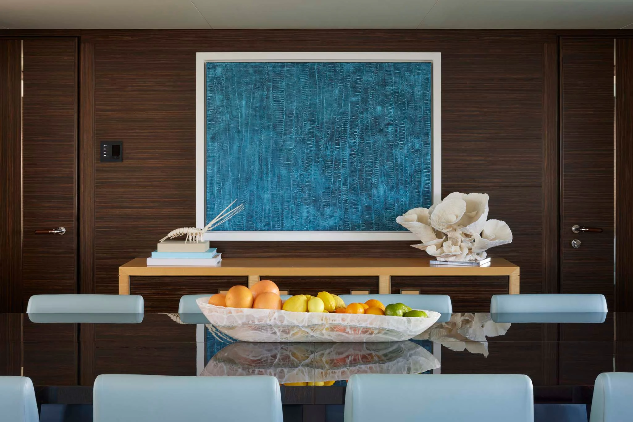 a table with fruit on it aboard REVELRY Yacht for Sale