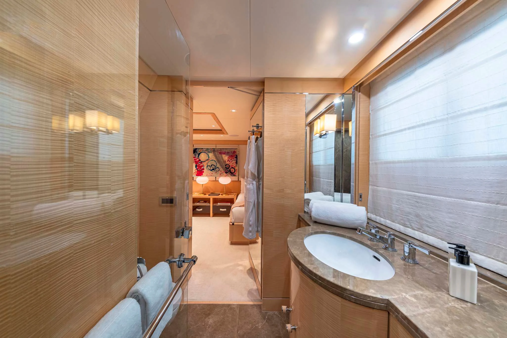 a bathroom with a sink and a bathtub aboard REVELRY Yacht for Sale
