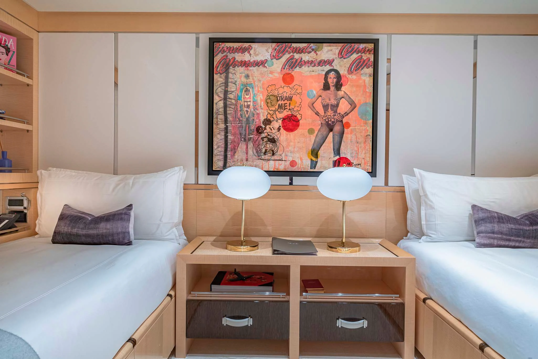 a room with a bed and a desk aboard REVELRY Yacht for Sale