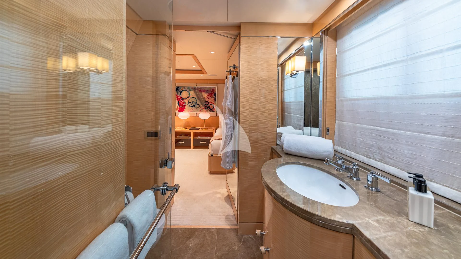 a bathroom with a sink and a mirror aboard REVELRY Yacht for Sale