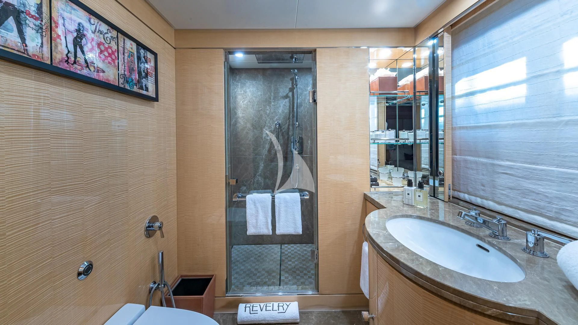 a bathroom with a sink and a shower aboard REVELRY Yacht for Sale