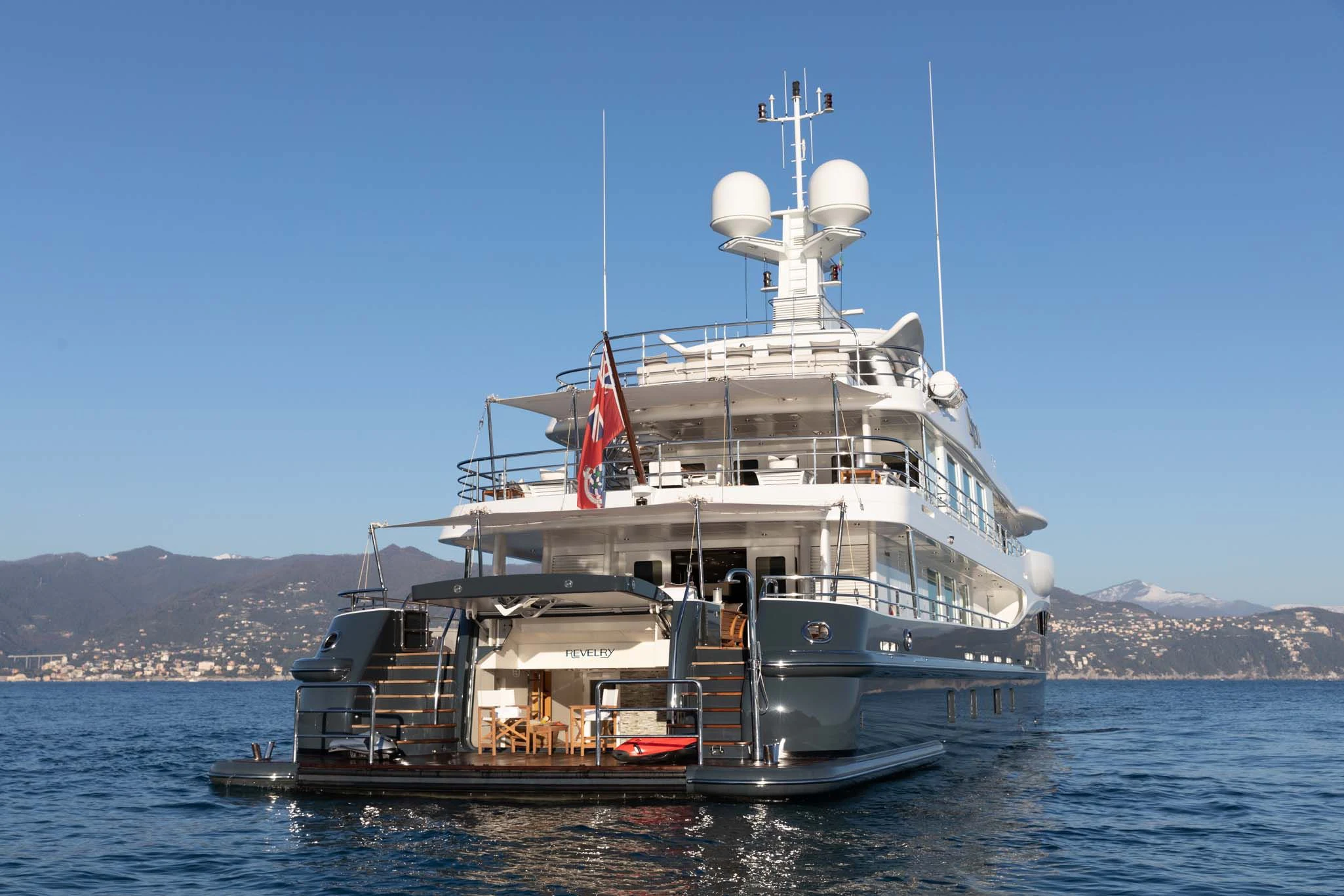 a large ship in the water aboard REVELRY Yacht for Sale