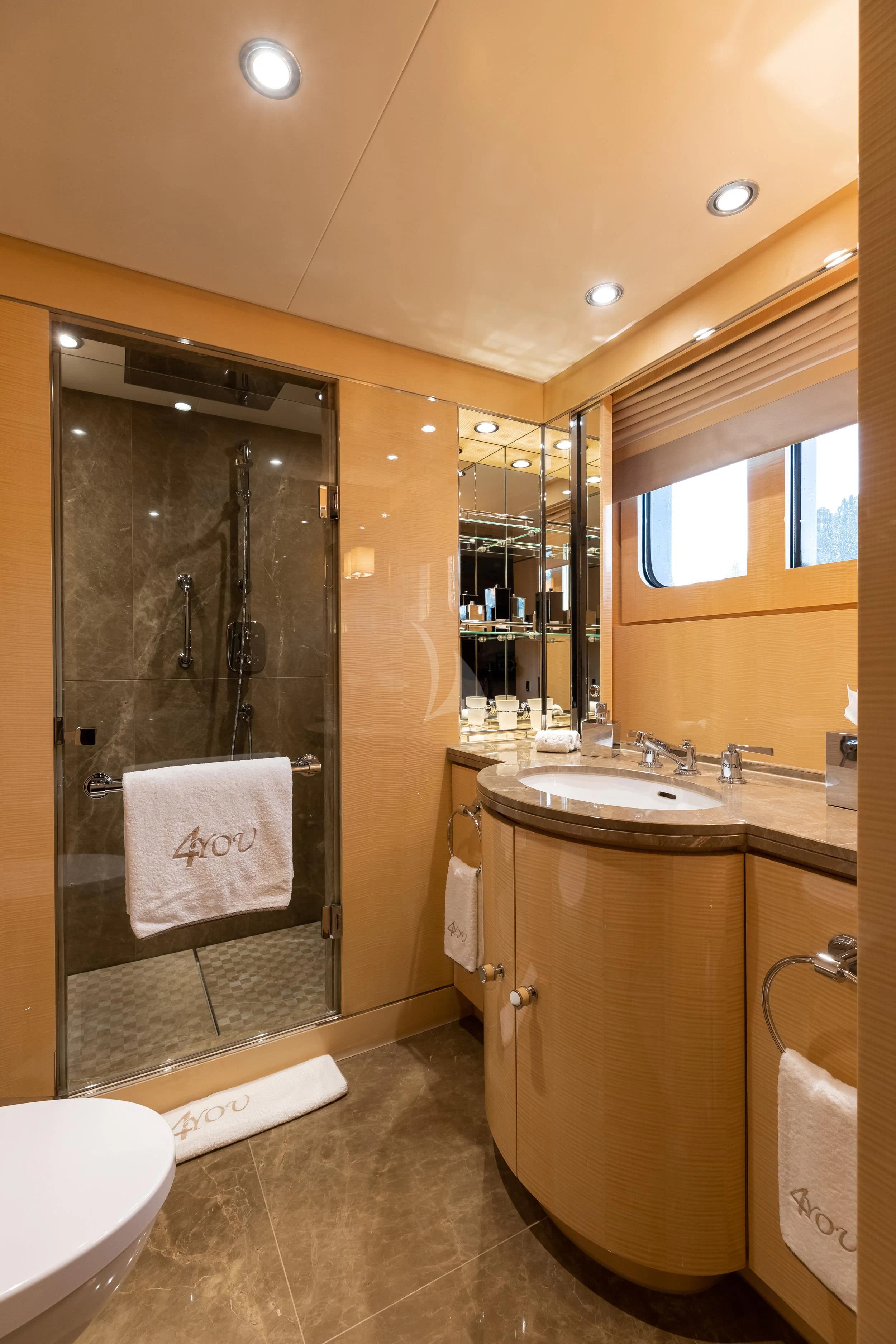 a bathroom with a large shower aboard REVELRY Yacht for Sale