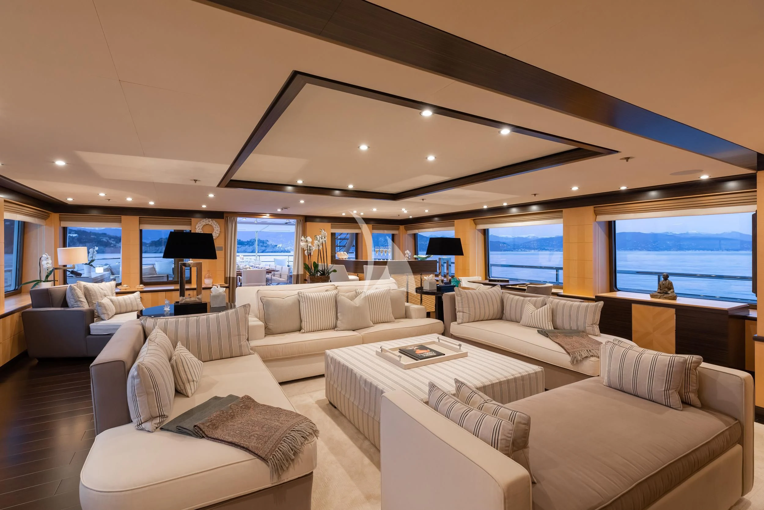 a living room with a large window aboard REVELRY Yacht for Sale