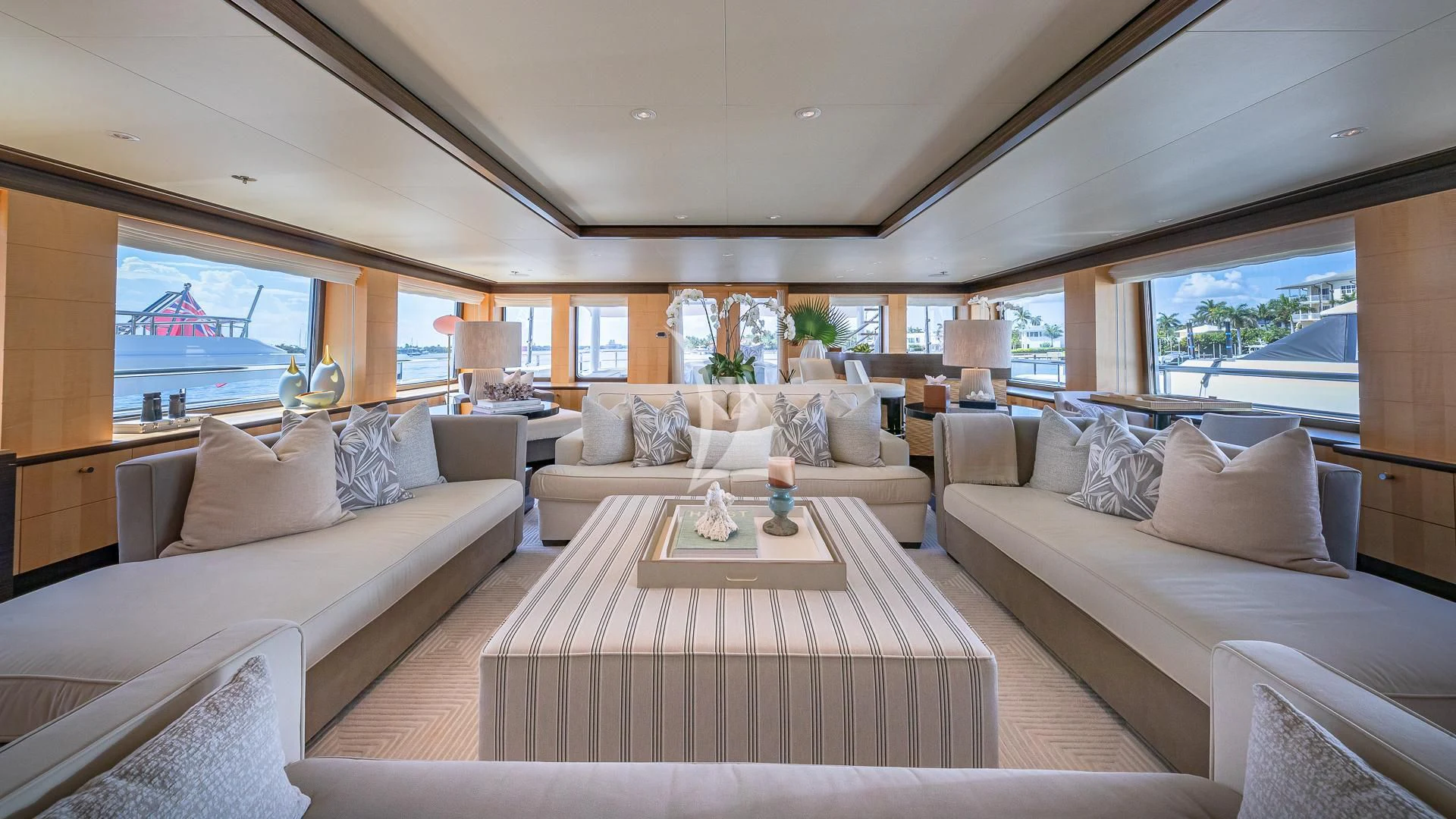 a living room with a large window aboard REVELRY Yacht for Sale