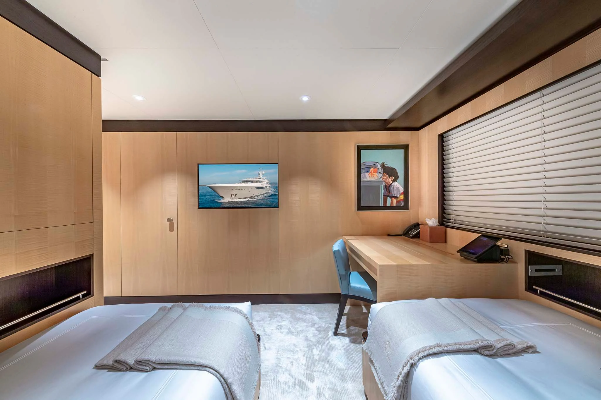 a room with two beds aboard REVELRY Yacht for Sale
