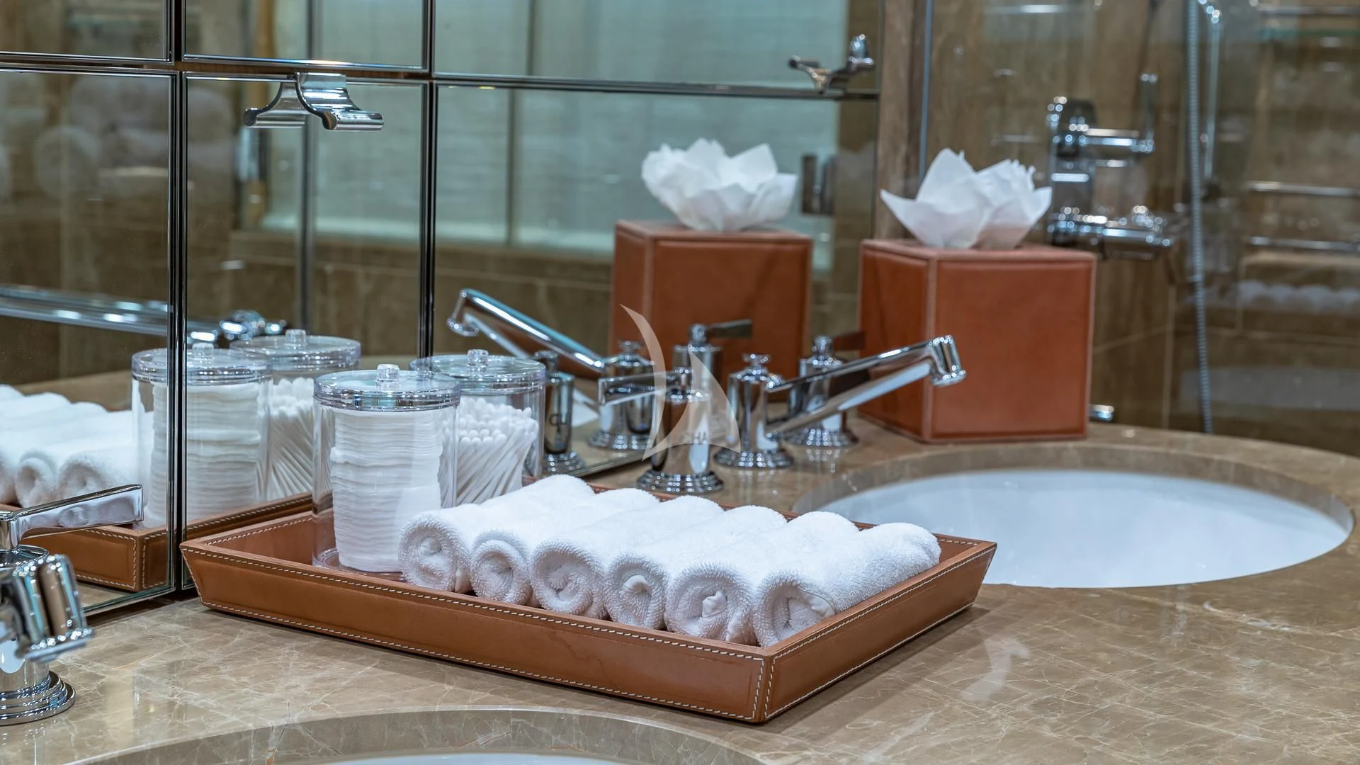 a bathroom sink with a large mirror aboard REVELRY Yacht for Sale