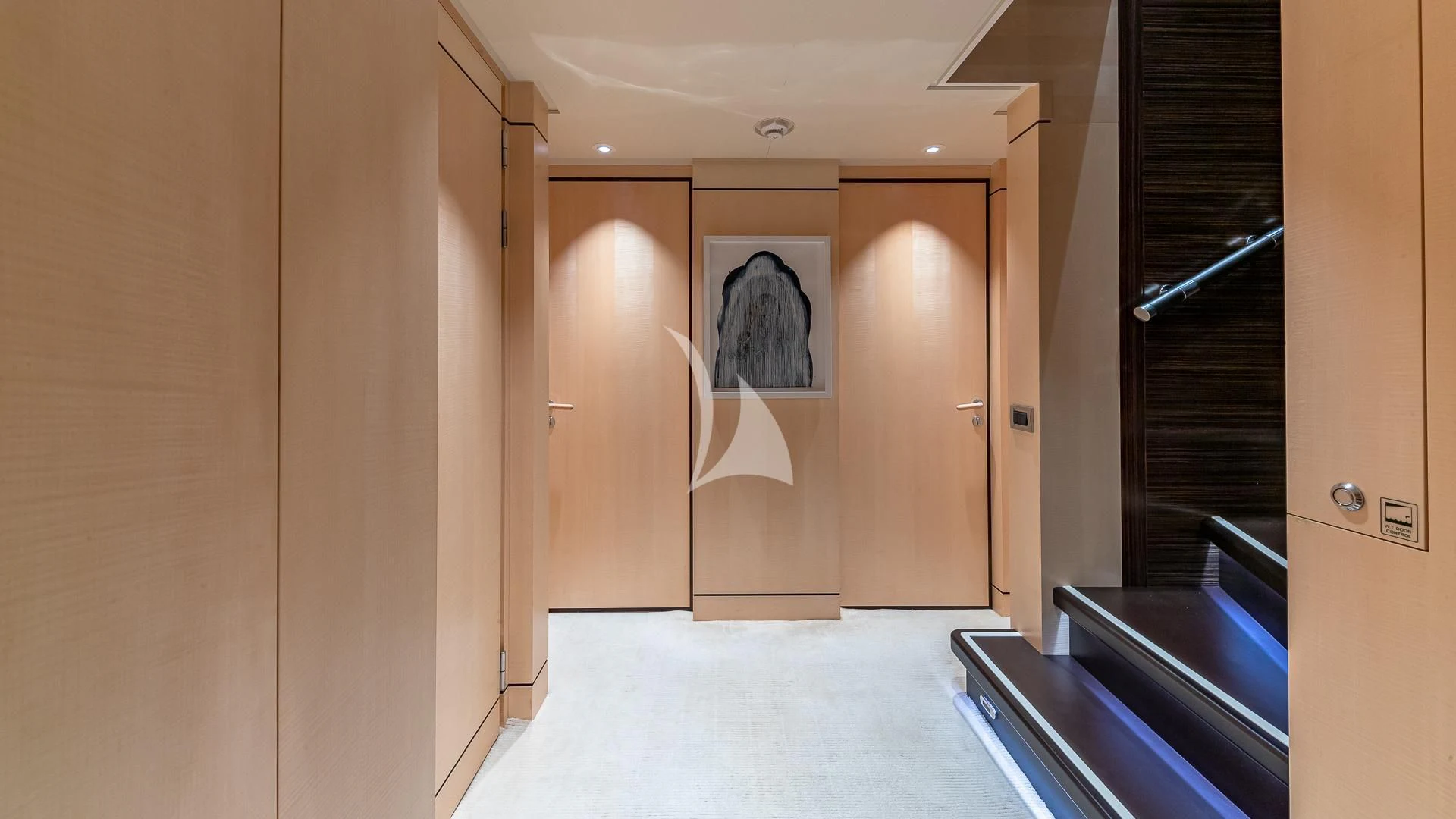 a room with a large mirror and a large door aboard REVELRY Yacht for Sale