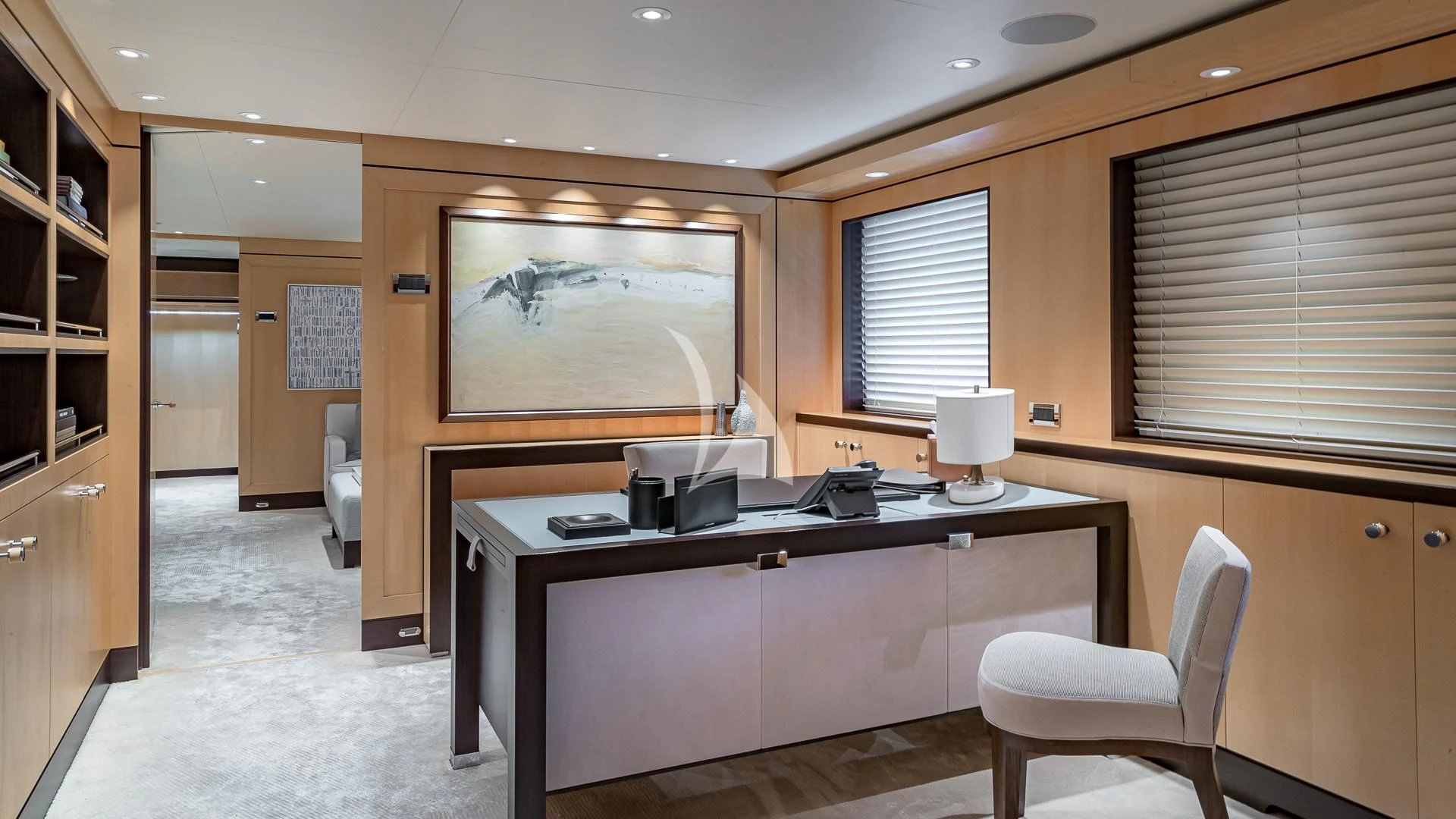 a room with a desk and a chair aboard REVELRY Yacht for Sale