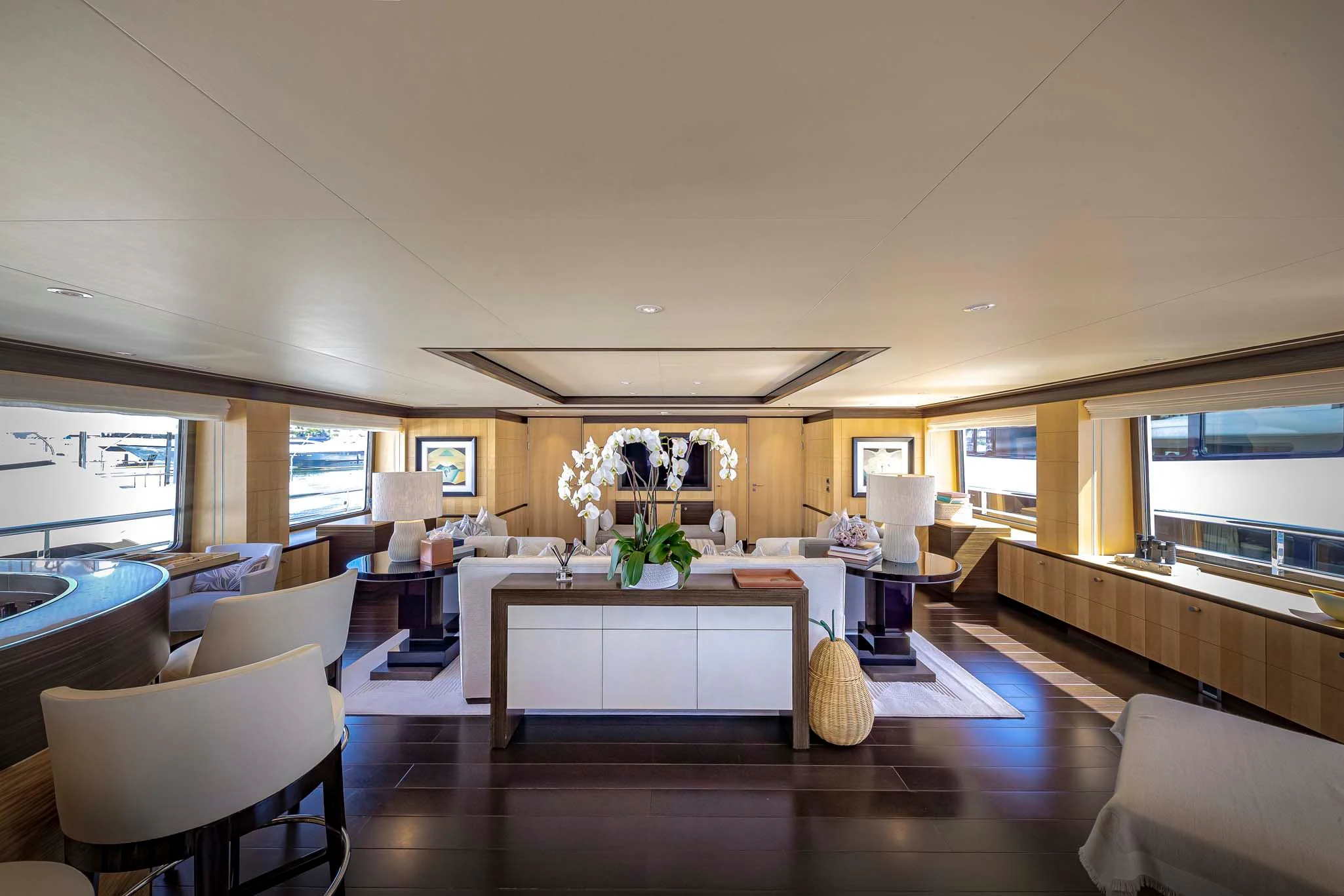 a room with a table and chairs aboard REVELRY Yacht for Sale