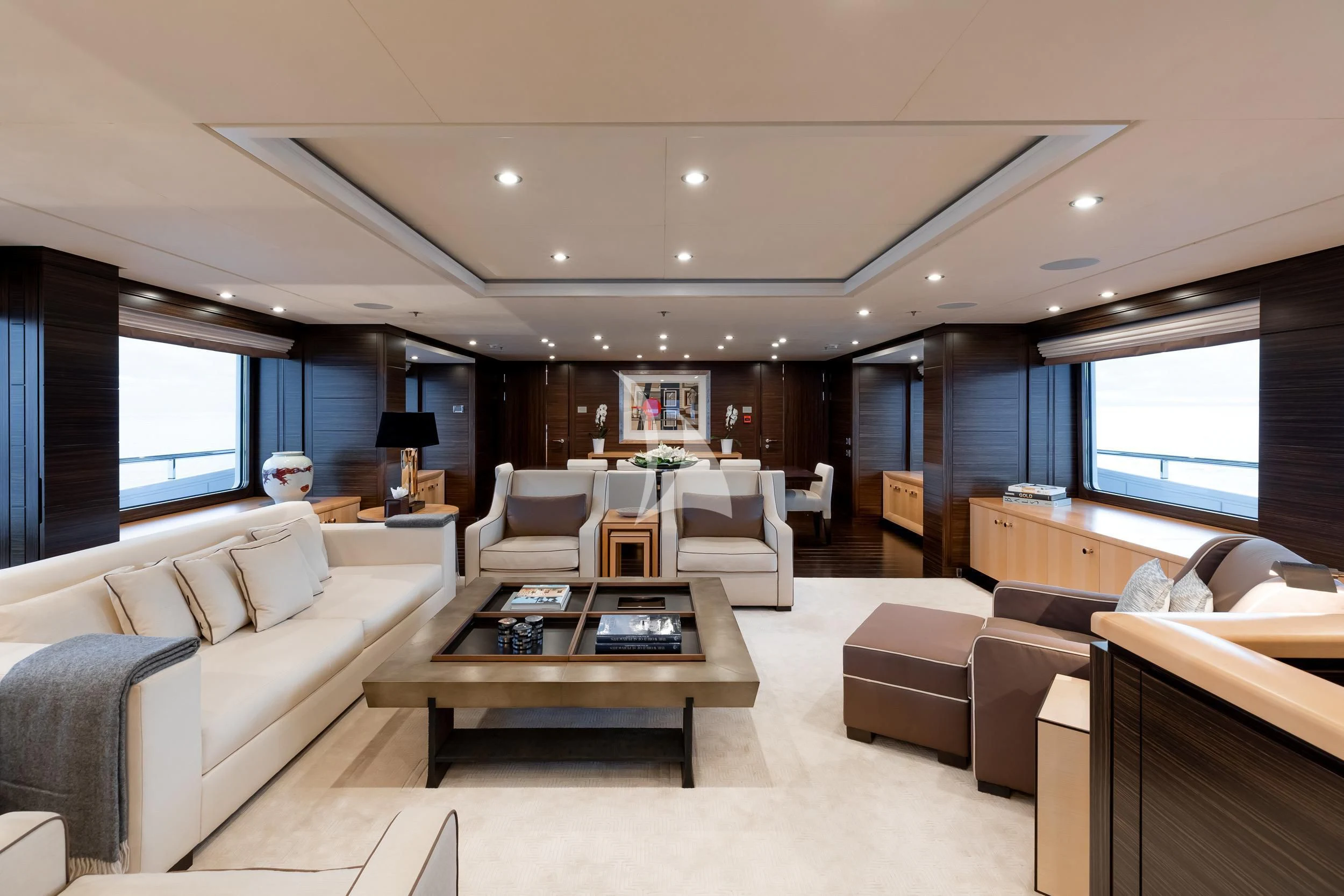 a living room with a large window aboard REVELRY Yacht for Sale