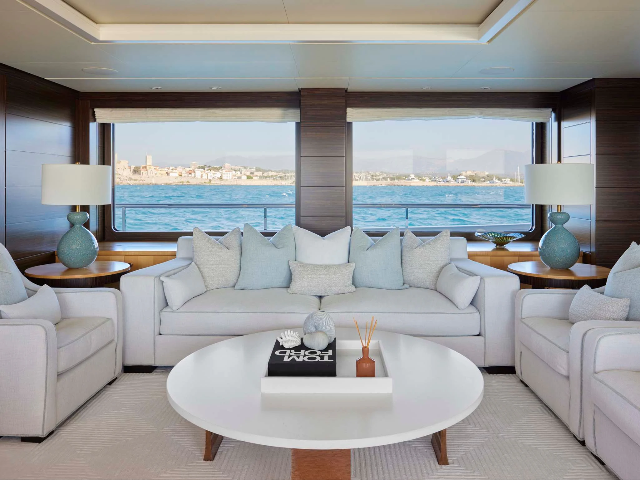 a living room with a large window aboard REVELRY Yacht for Sale