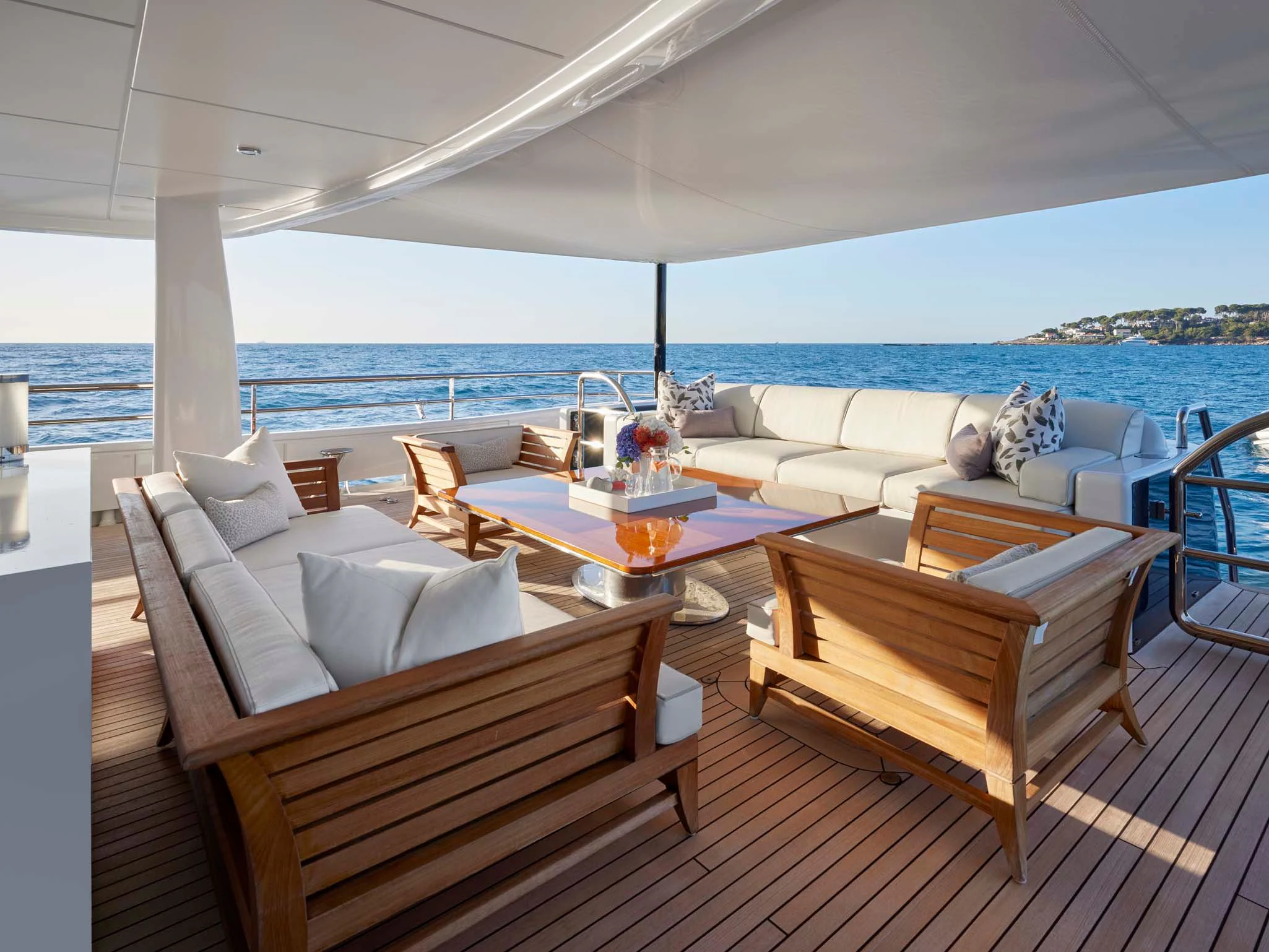 a room with a table and chairs aboard REVELRY Yacht for Sale