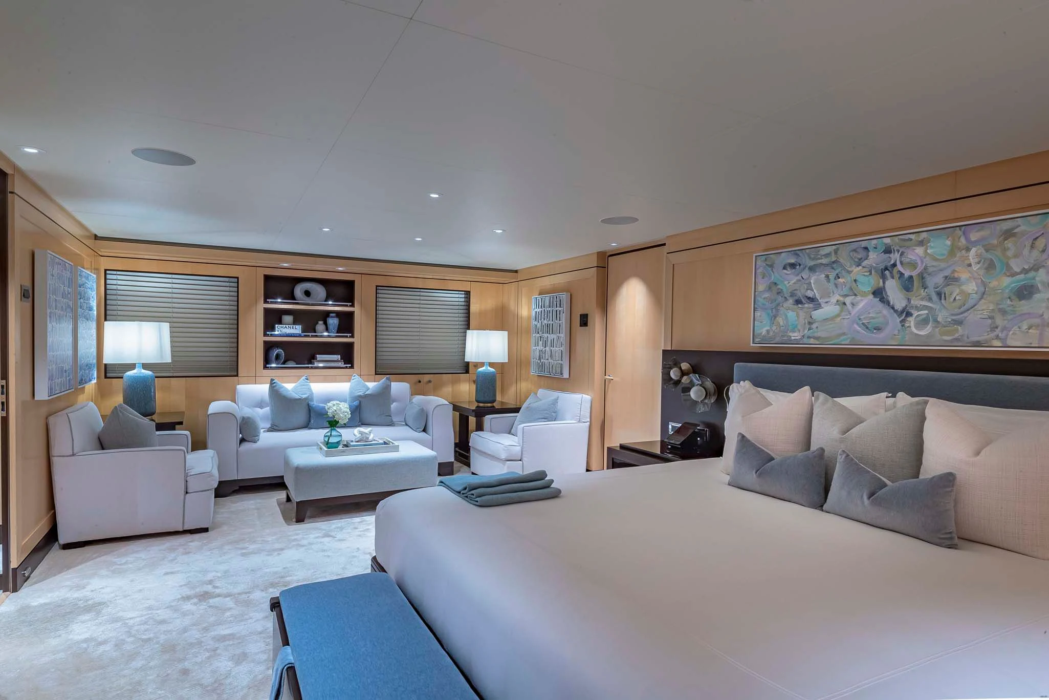 a large bedroom with a large bed aboard REVELRY Yacht for Sale