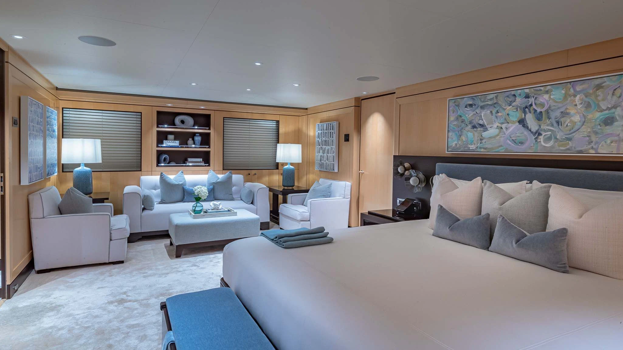 a large bedroom with a large bed aboard REVELRY Yacht for Sale