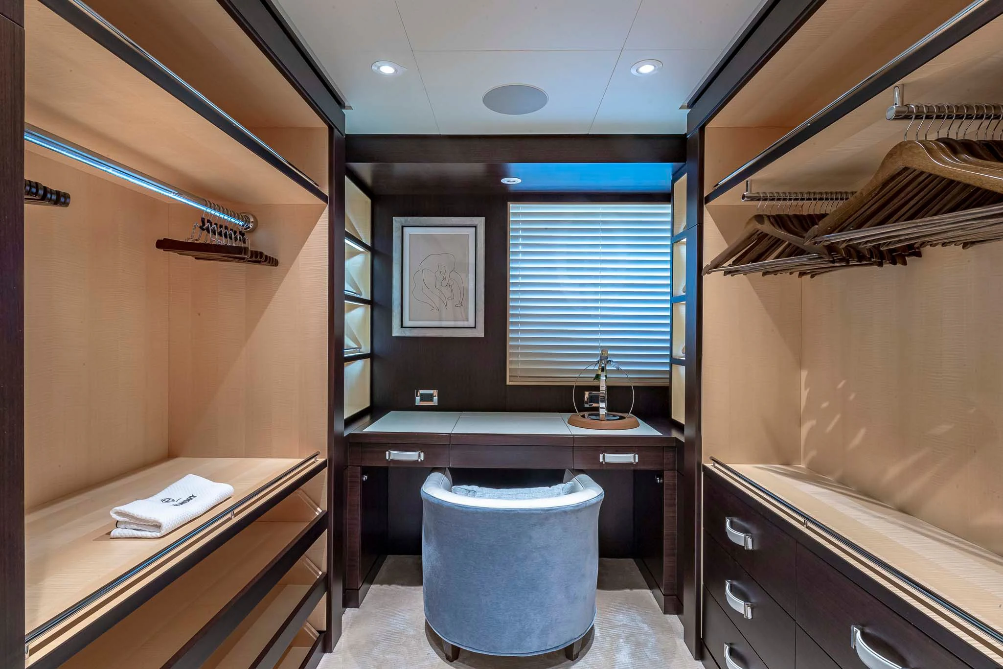 a bathroom with a sink and a toilet aboard REVELRY Yacht for Sale