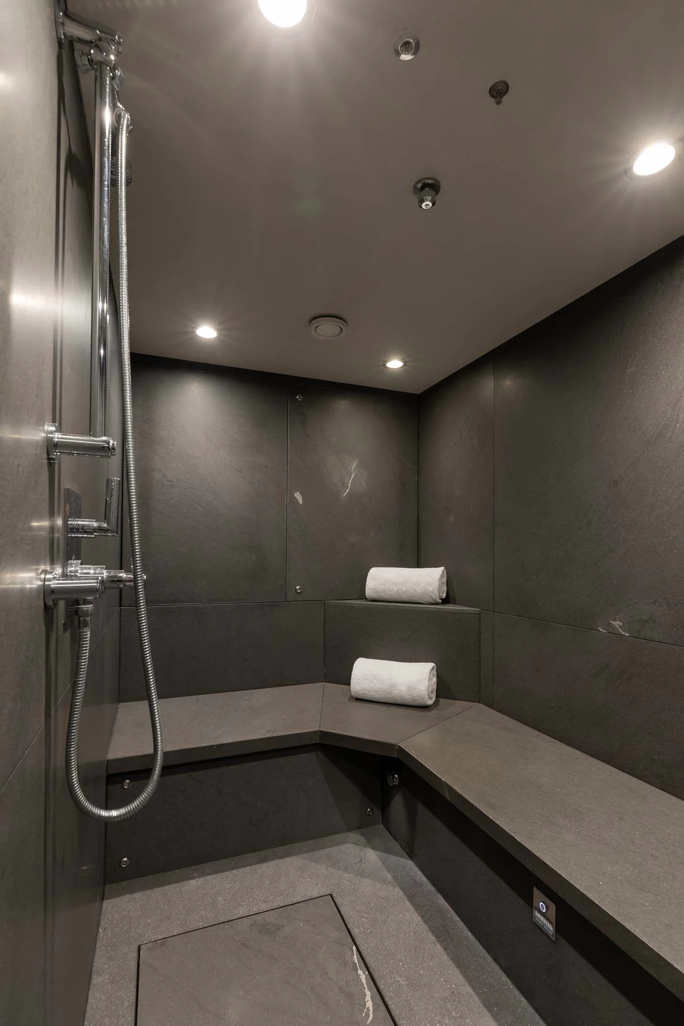 a bathroom with a shower aboard REVELRY Yacht for Sale
