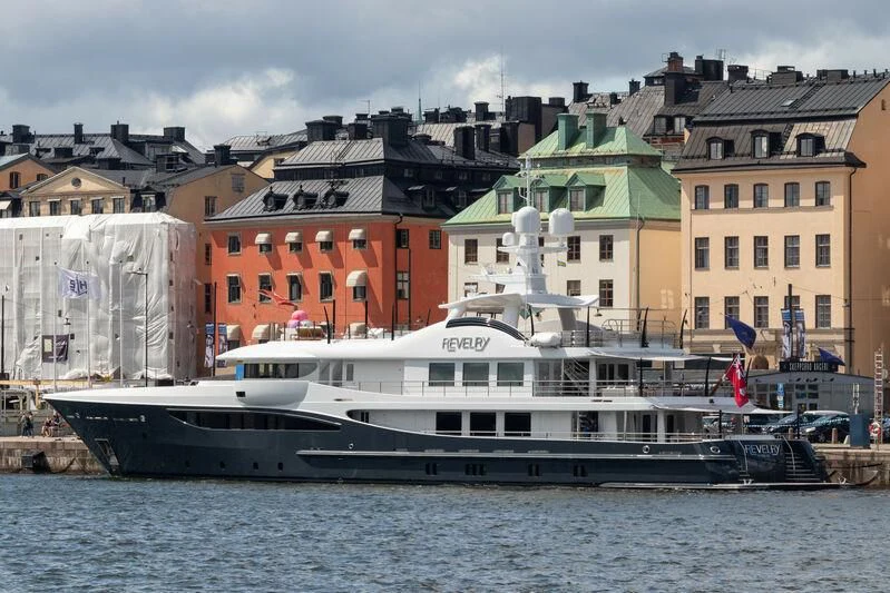 a large boat in the water aboard REVELRY Yacht for Sale
