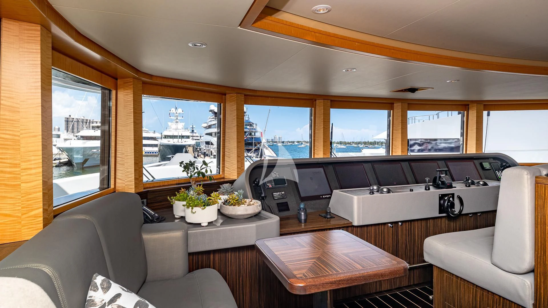 a living room with a large window aboard REVELRY Yacht for Sale