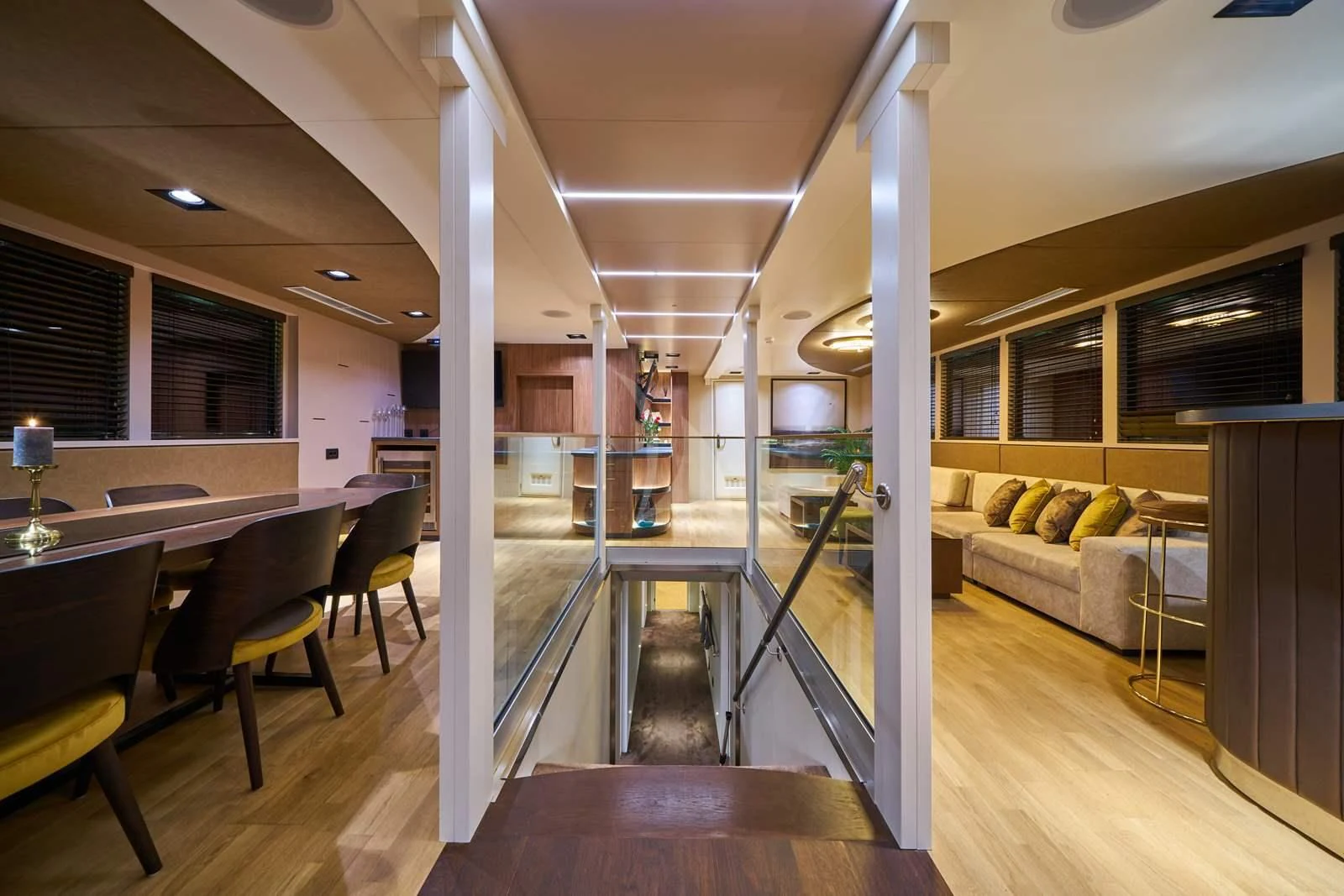 a room with a table and chairs aboard RARA AVIS Yacht for Charter