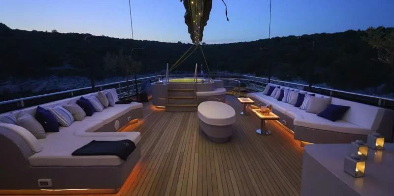 a room with a deck and a pool aboard RARA AVIS Yacht for Charter