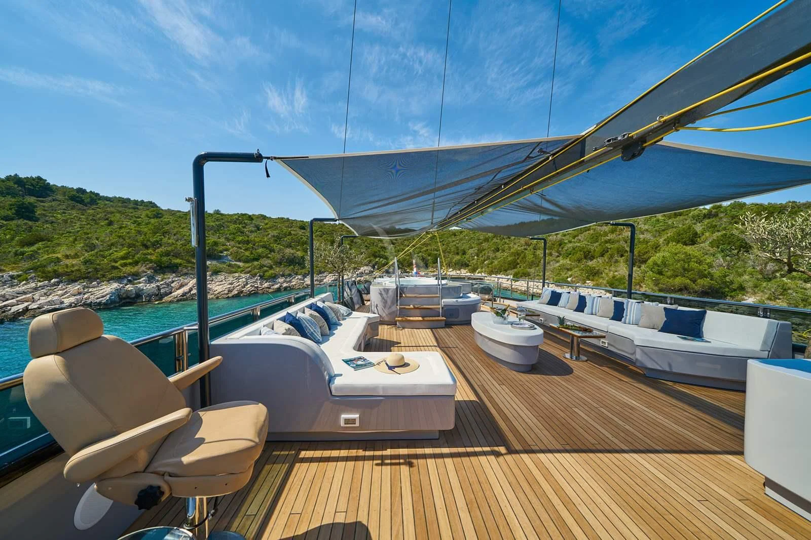 a deck with a view of the water and the land aboard RARA AVIS Yacht for Charter