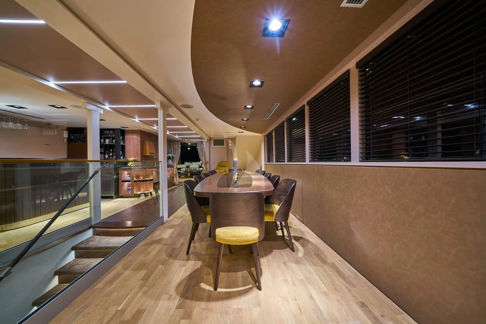 a room with a table and chairs aboard RARA AVIS Yacht for Charter