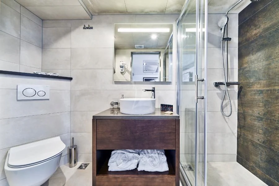 a bathroom with a sink and a toilet aboard RARA AVIS Yacht for Charter