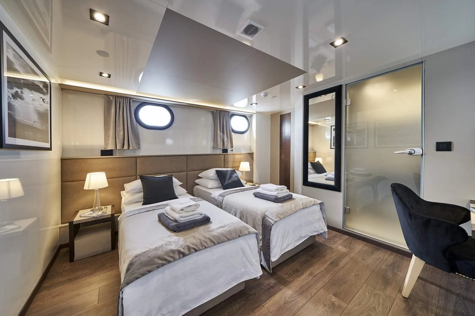 a room with two beds aboard RARA AVIS Yacht for Charter