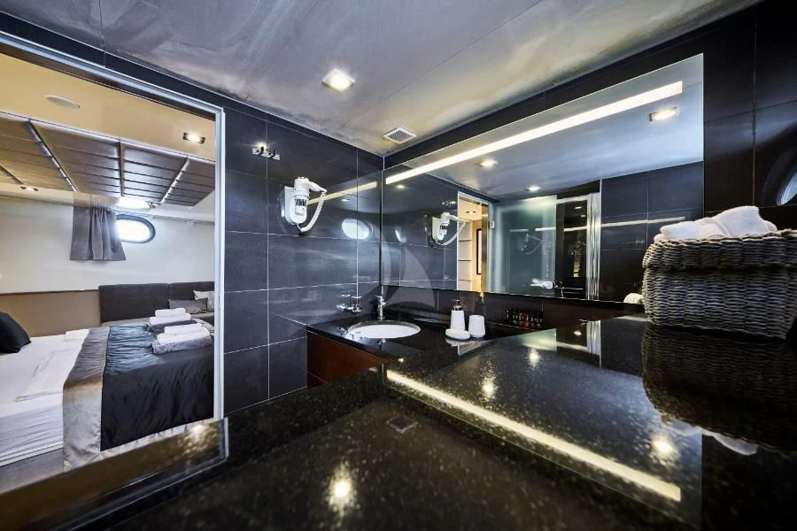 a bathroom with a large countertop aboard RARA AVIS Yacht for Charter