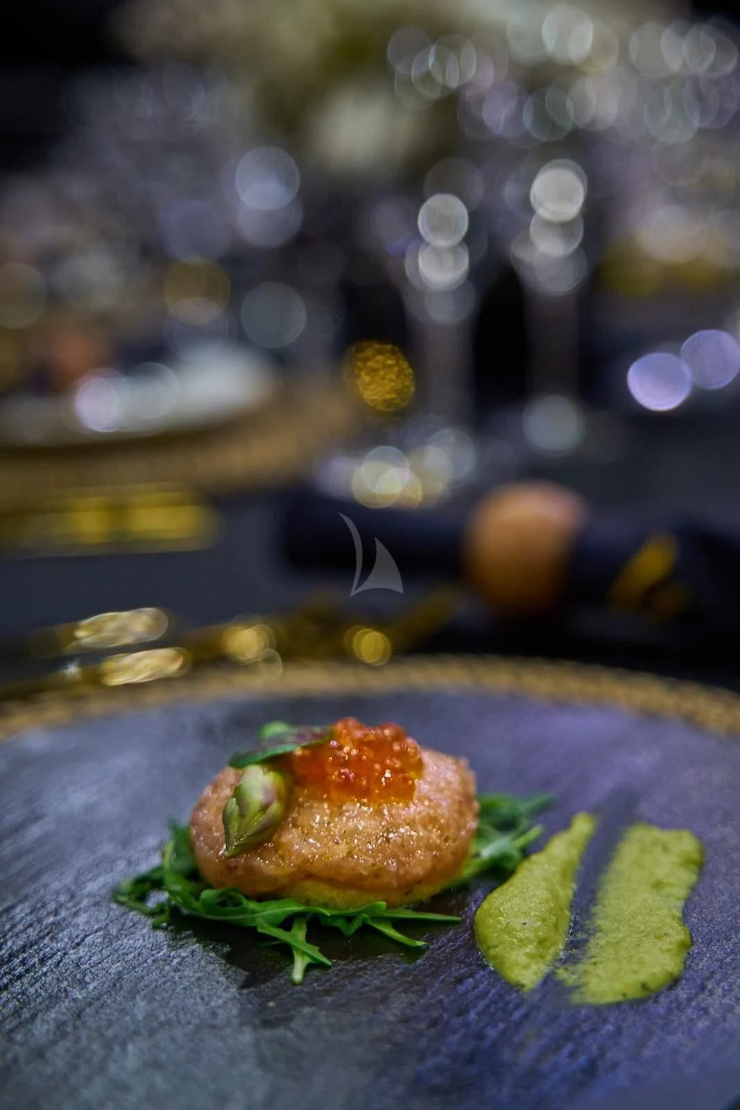 a sandwich on a plate aboard RARA AVIS Yacht for Charter