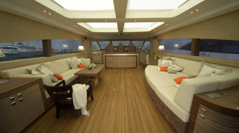 a room with a bed and a desk aboard EL DISPARO Yacht for Sale