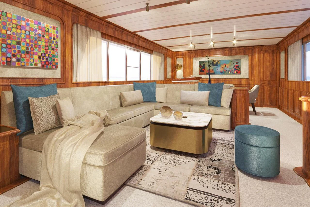 a living room with a couch and a table aboard A&A Yacht for Charter