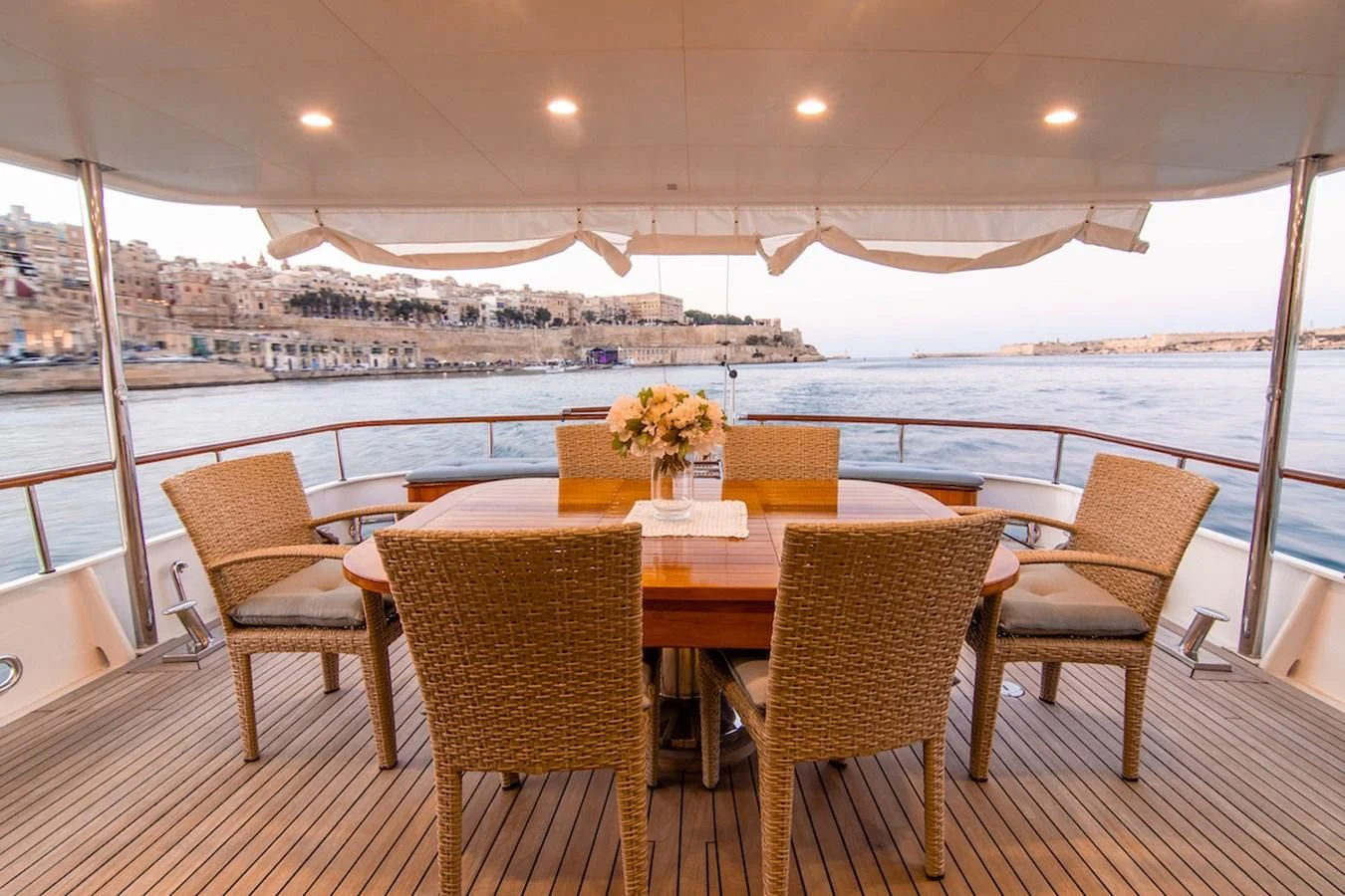 a table set for a meal aboard A&A Yacht for Charter