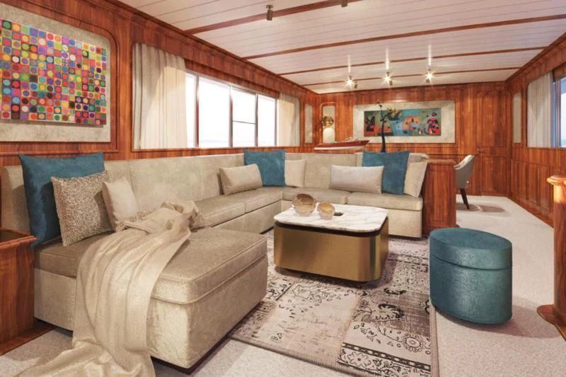 a living room with couches and a table aboard A&A Yacht for Charter