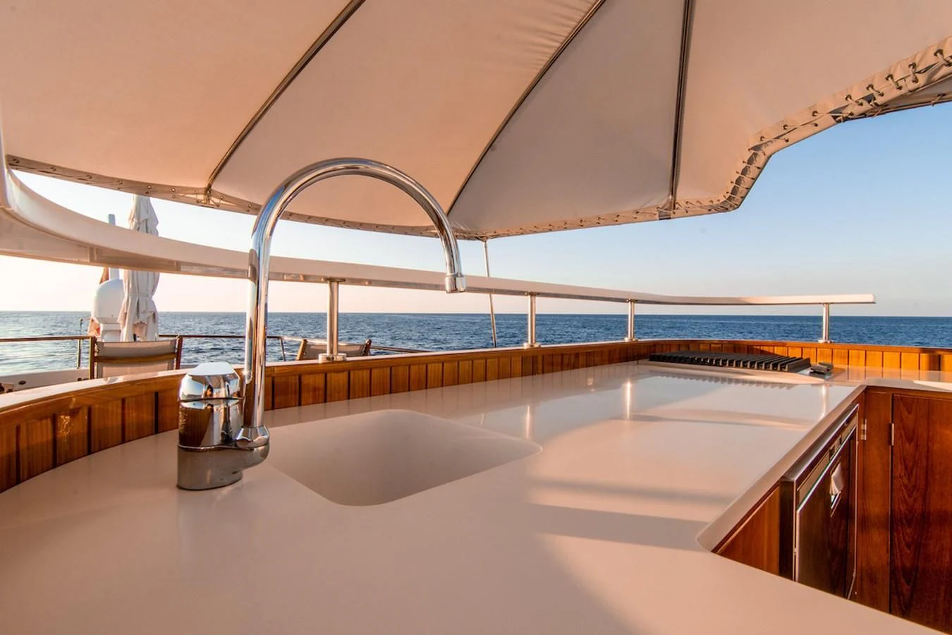 a large kitchen with a large window aboard A&A Yacht for Charter