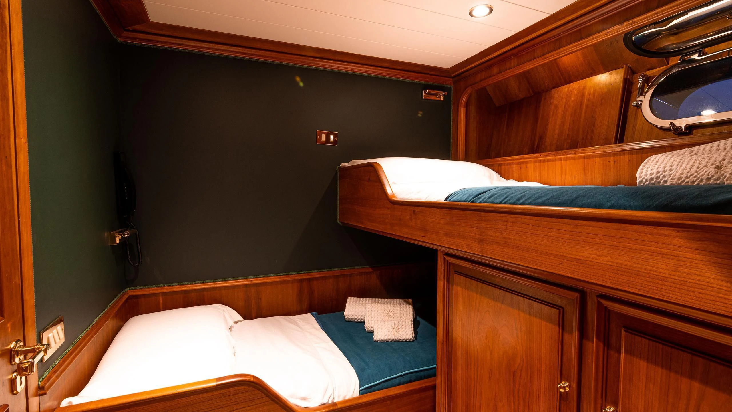a room with two beds aboard A&A Yacht for Charter