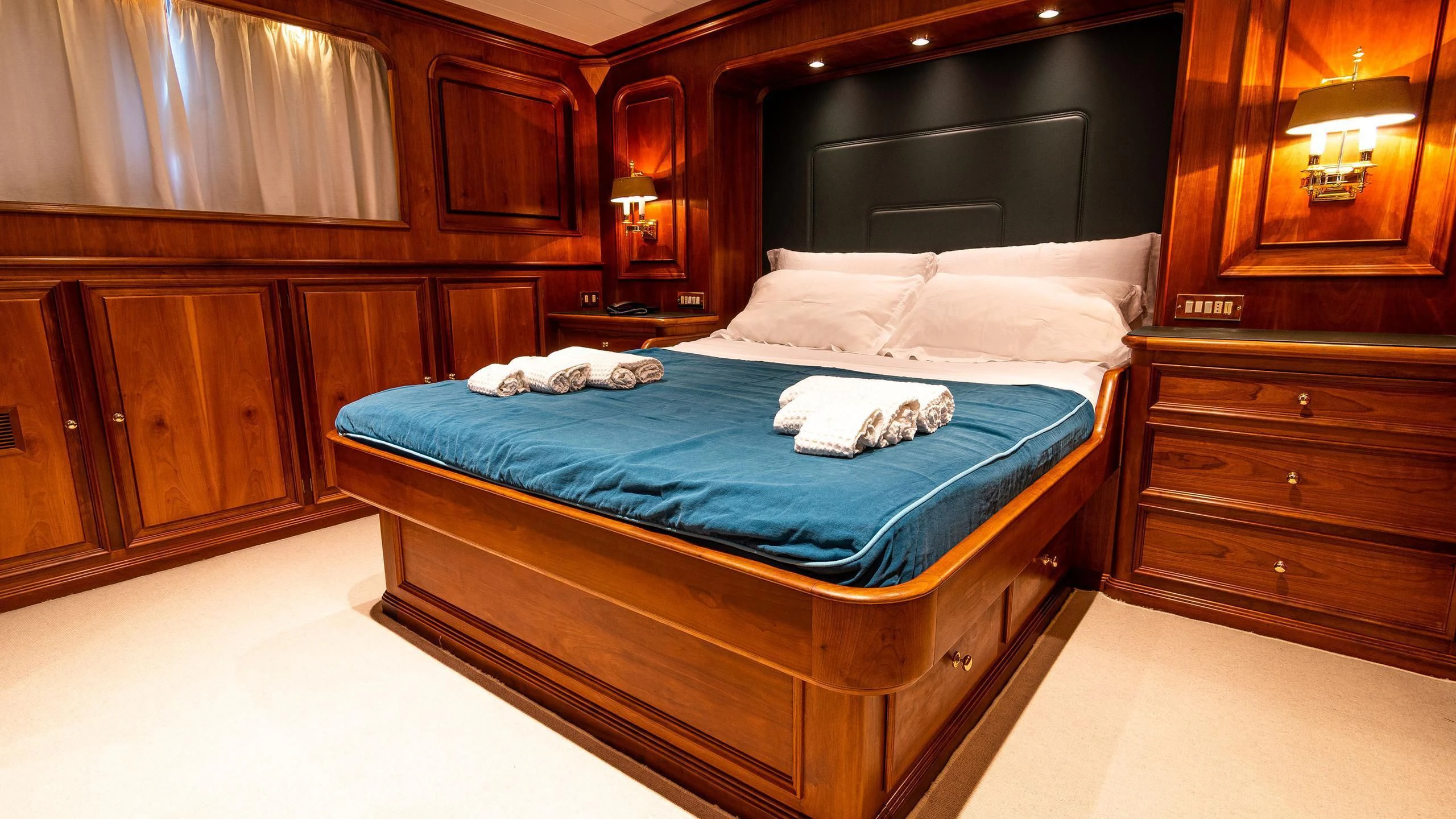 a bed in a room aboard A&A Yacht for Charter